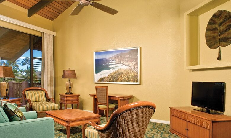 Home exchange at Wyndham Ka'Eo Kai, furnished living room with TV
