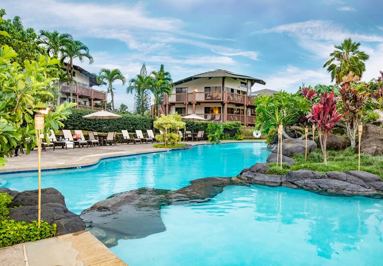 Home exchange at Wyndham Ka'Eo Kai, resort pool with lounge seating