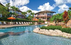 Home exchange at Wyndham Ka'Eo Kai, resort pool with lounge seating