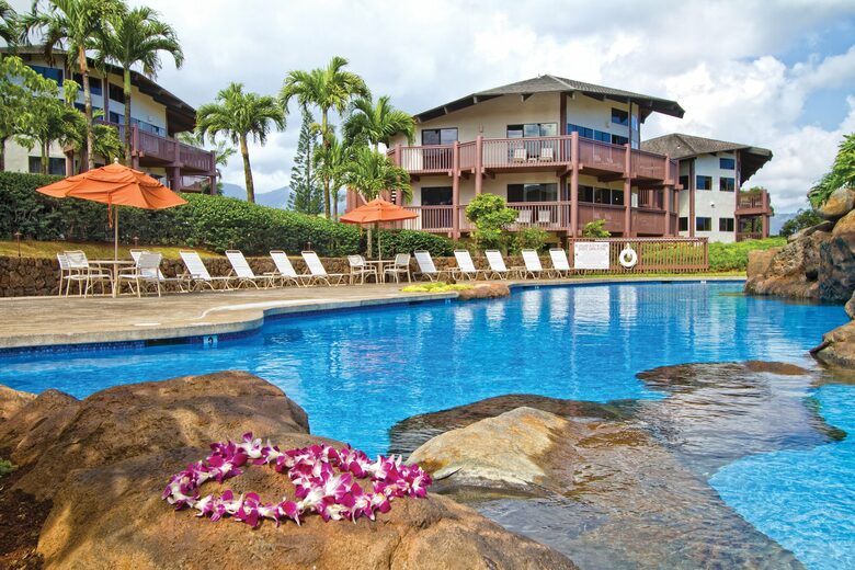 Home exchange at Wyndham Ka'Eo Kai, resort pool with lounge seating