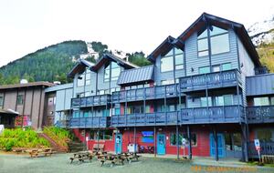 front of building with Alyeska in the background