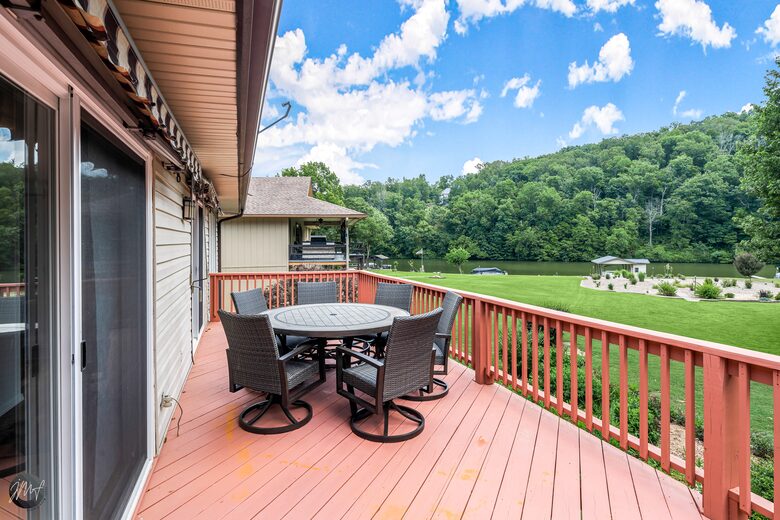 Home Exchange in Bella Vista, AR, top deck with views of water