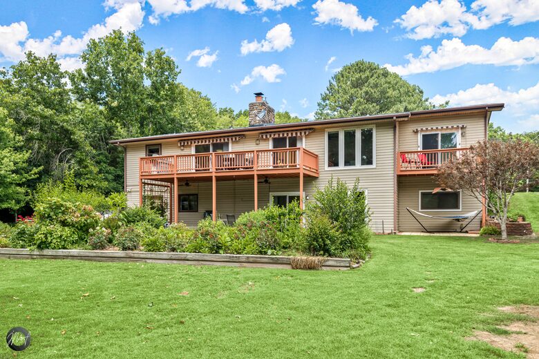 Home Exchange in Bella Vista, AR, view of back of home