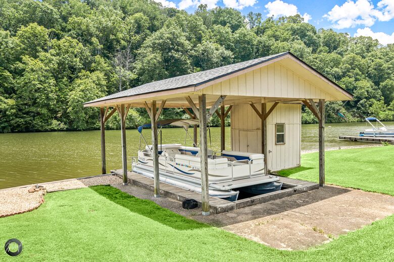 Home Exchange in Bella Vista, AR, boat dock and house