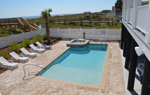 Home Exchange in Garden City, SC, resort style pool and hot tub
