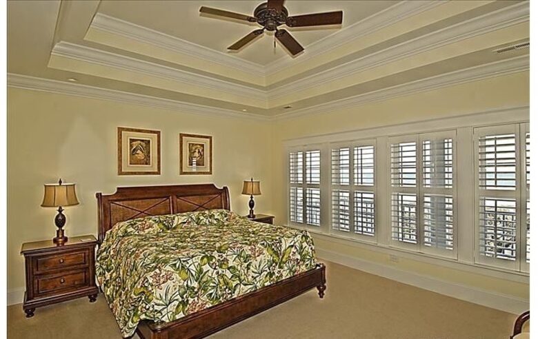 Home Exchange in Garden City, SC master bedroom with water views