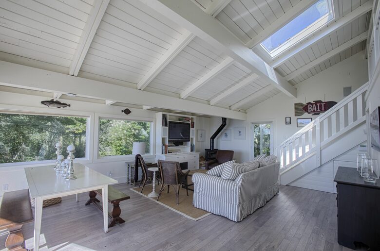 Open cottage living and dining areas