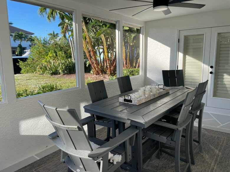 Home Exchange in Naples, FL screened in Lanai dinner table
