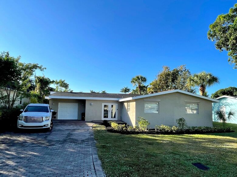 Home Exchange in Naples, FL one story home with covered parking