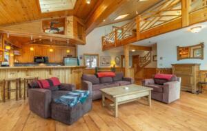 Home Exchange in Truckee, CA, living room with high ceilings and loft