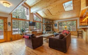 Home Exchange in Truckee, CA, living room with wall to wall windows