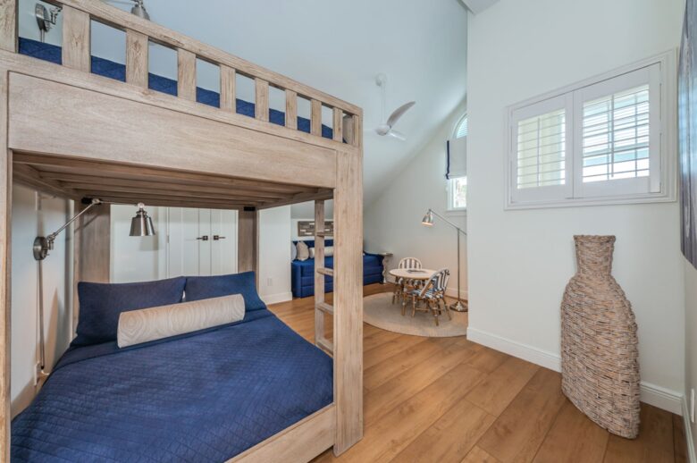 Bunk room with full-over-full beds and twin daybed with trundle.