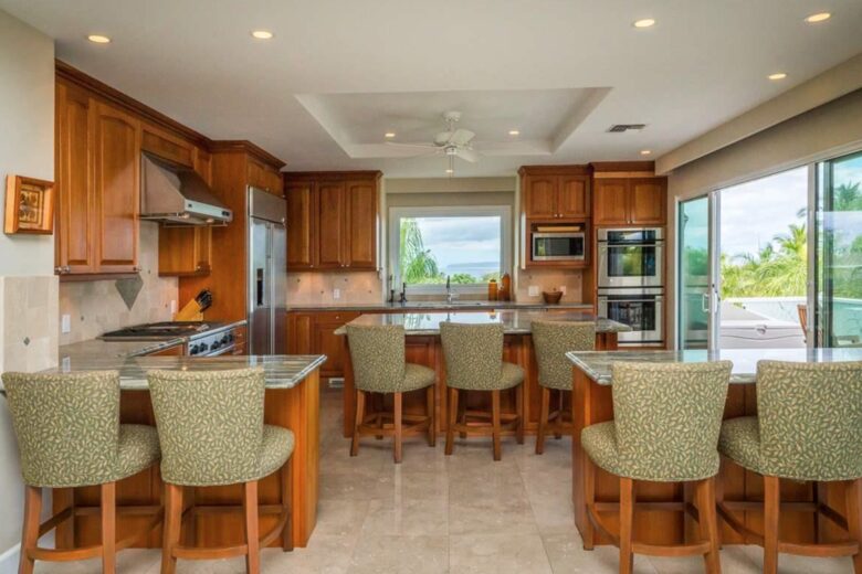 Open chef's kitchen with multiple eat-in bars