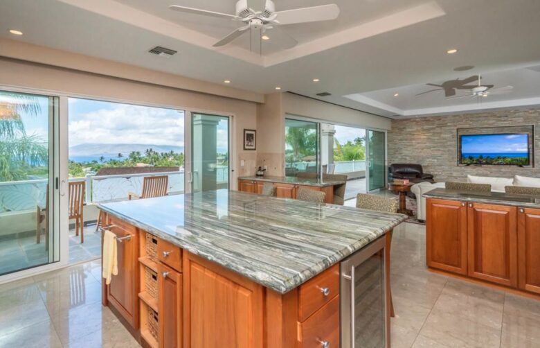 Open chef's kitchen open to balcony