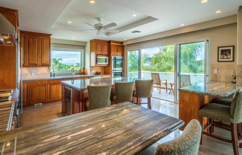 Open chef's kitchen open to balcony