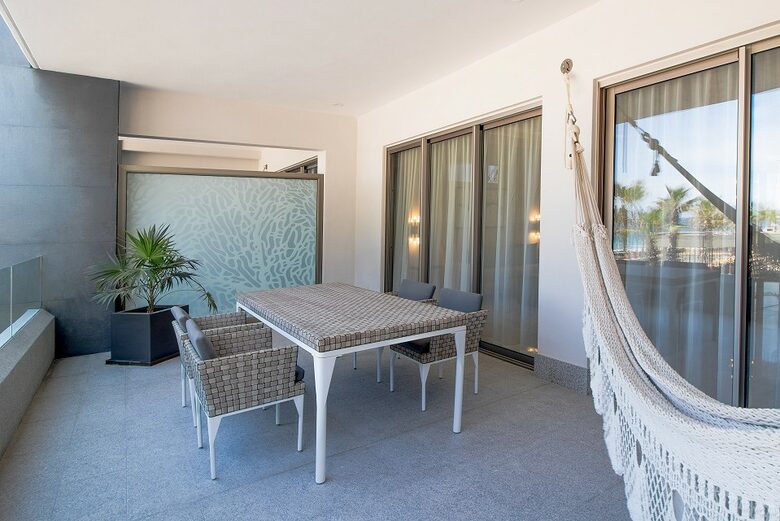 Home exchange in Los Cabos at Garza Blanca Resort, balcony table