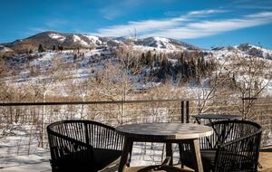 Outdoor breakfast table with mountain views