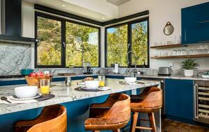 Stunning kitchen with large island and eat-in bar