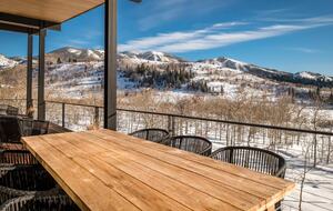 Outdoor dining with mountain views