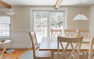 Bright Sunny Dining Area Seats 8 and Opens up to Back Deck