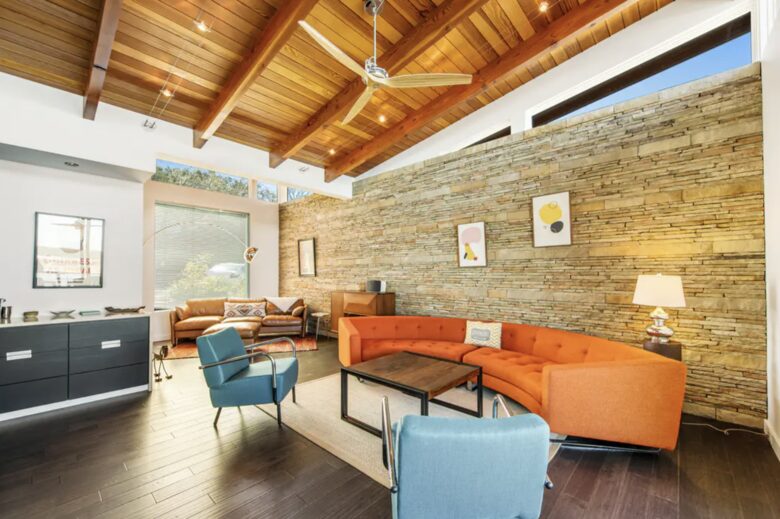 Home Exchange in Austin, TX family room with round couch