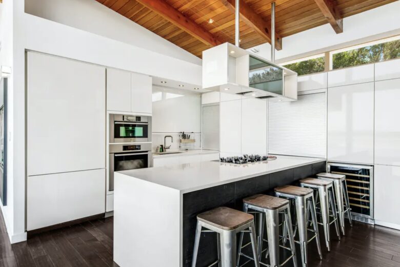Home Exchange in Austin, TX bright modern kitchen counter seating