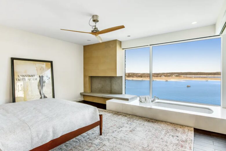 Home Exchange in Austin, TX master suite with sweeping views of lake