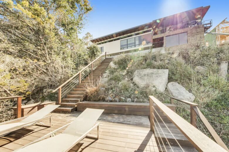 Home Exchange in Austin, TX tanning deck with views of house