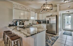 Kitchen with granite countertops and eat-in bar