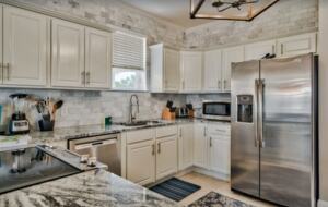 Kitchen with granite countertops and eat-in bar
