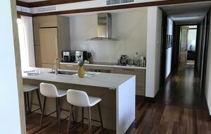 Kitchen and hallway to 3 of the bedrooms