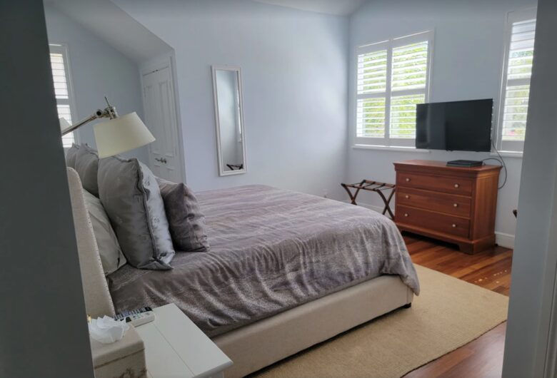 Front bedroom with king bed ensuite four head shower