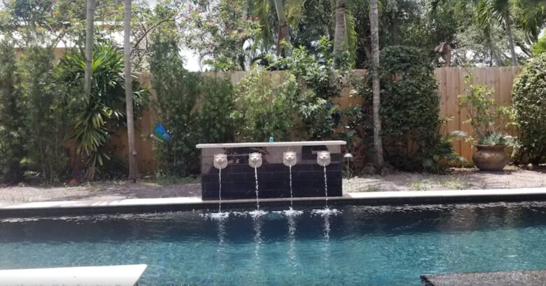 Pool fountain to add to the ambiance of the backyard