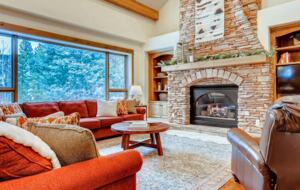 Living room with fireplace and views