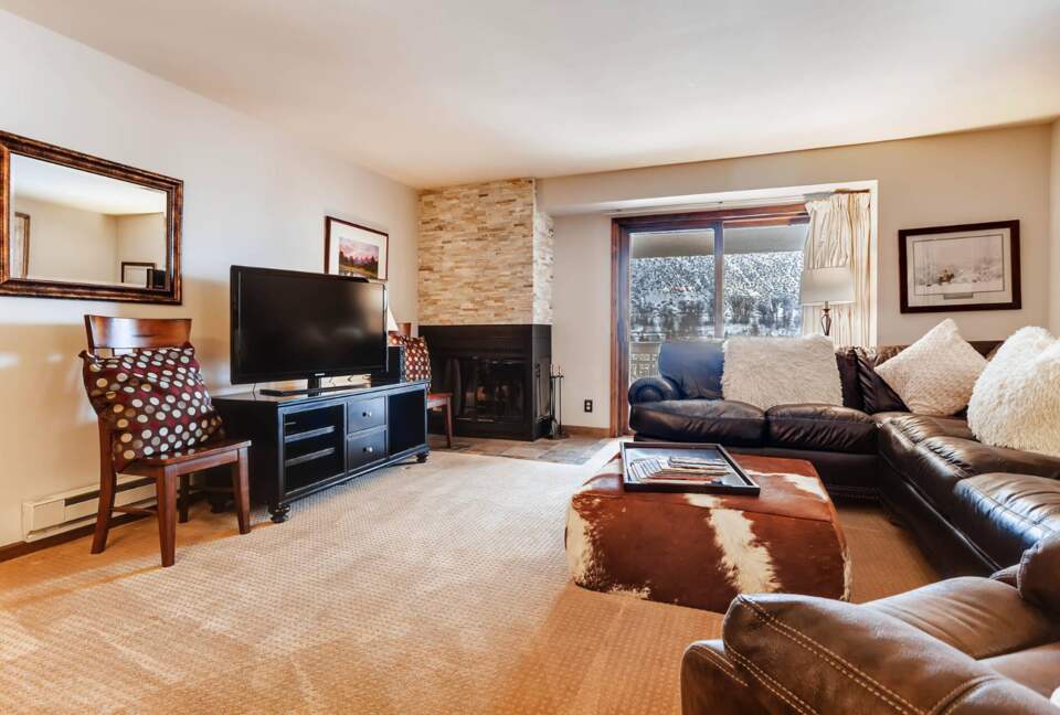 Den with fireplace