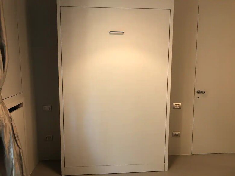 Full size bed folds away when not required