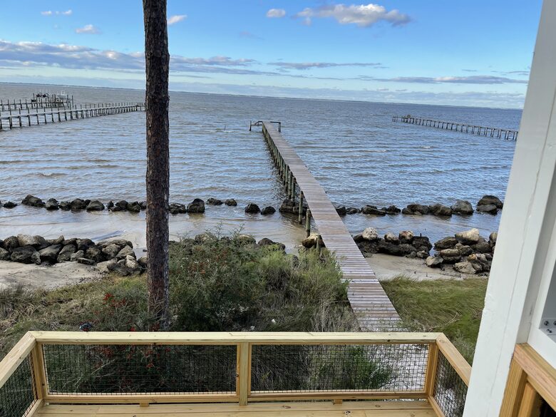 High Times bayfront with pier, swimming pool and 2 hot tubs on #1 Beach in America - St George Island, Florida