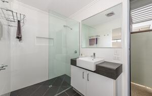 Ensuite to main bedroom leading to outdoor shower