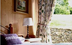 Master bedroom view into the fields and complete privacy