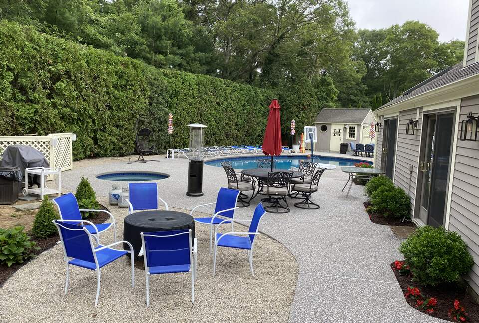 Backyard with pool, hot tub and ample seating