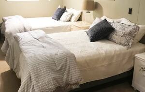 Back bedroom w/two queen sized beds