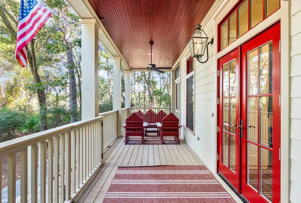 50 ft front porch with 2 large swings and rocking chairs