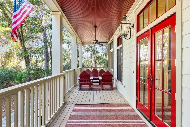 50 ft front porch with 2 large swings and rocking chairs
