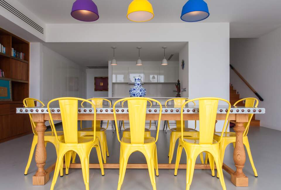 The dining table looking towards the Poliform kitchen
