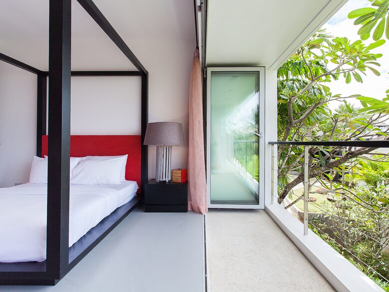The queen red bedroom downstairs has its own ensuite