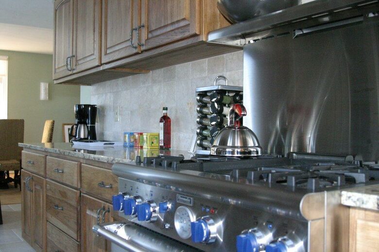 Thermador stove & oven w/everything imaginable in kitchen