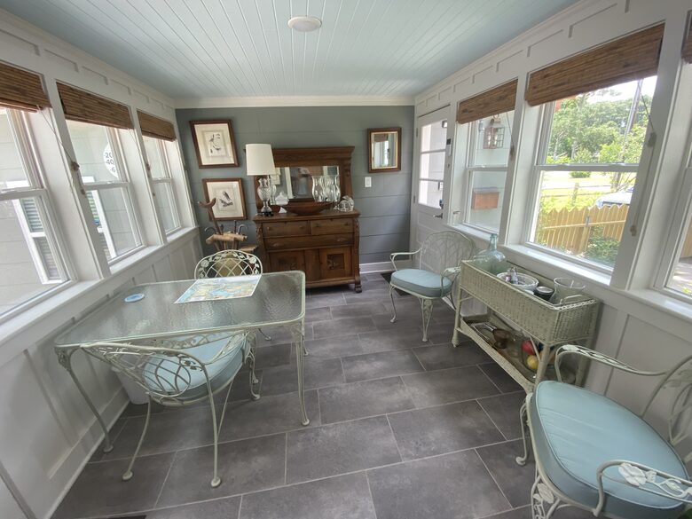 Breezeway dining room with garden views.