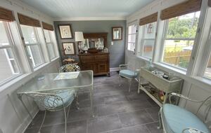 Breezeway dining room with garden views.