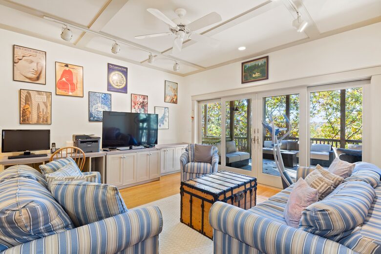 Lower level Family room with view of lower deck seating area