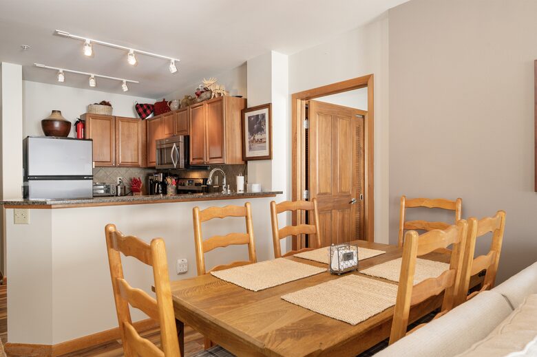 Dining table and kitchen